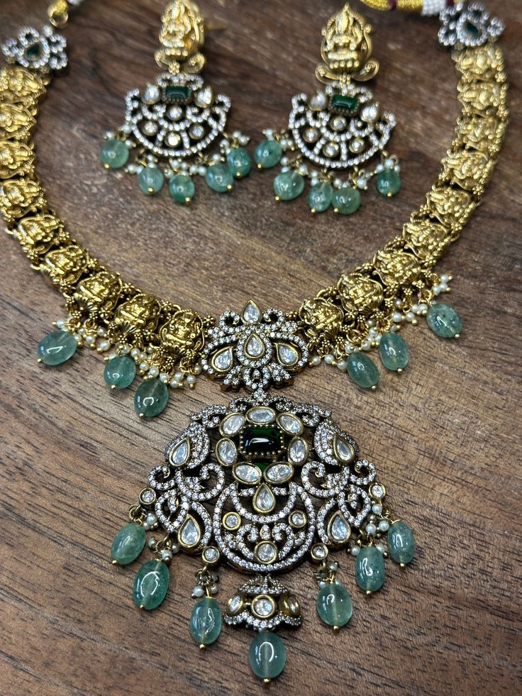 Victorian finish neckalce with earring Elegant Hand Set Brass Jewelry, Elegant Hand-set Brass Jewelry, Exquisite Hand Set Pendant Necklace, Elegant Hand-set Brass Necklaces, Elegant Brass Necklace With Hand Set Details, Elegant Brass Necklace With Hand Set, Elegant Hand Set Brass Necklace, Handmade Elegant Metal Kundan Necklace, Handmade Elegant Kundan Metal Necklace