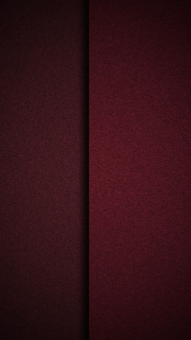 an image of two red walls that are in the same color as they appear to be dark