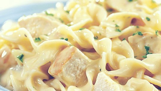 a close up of a plate of food with noodles