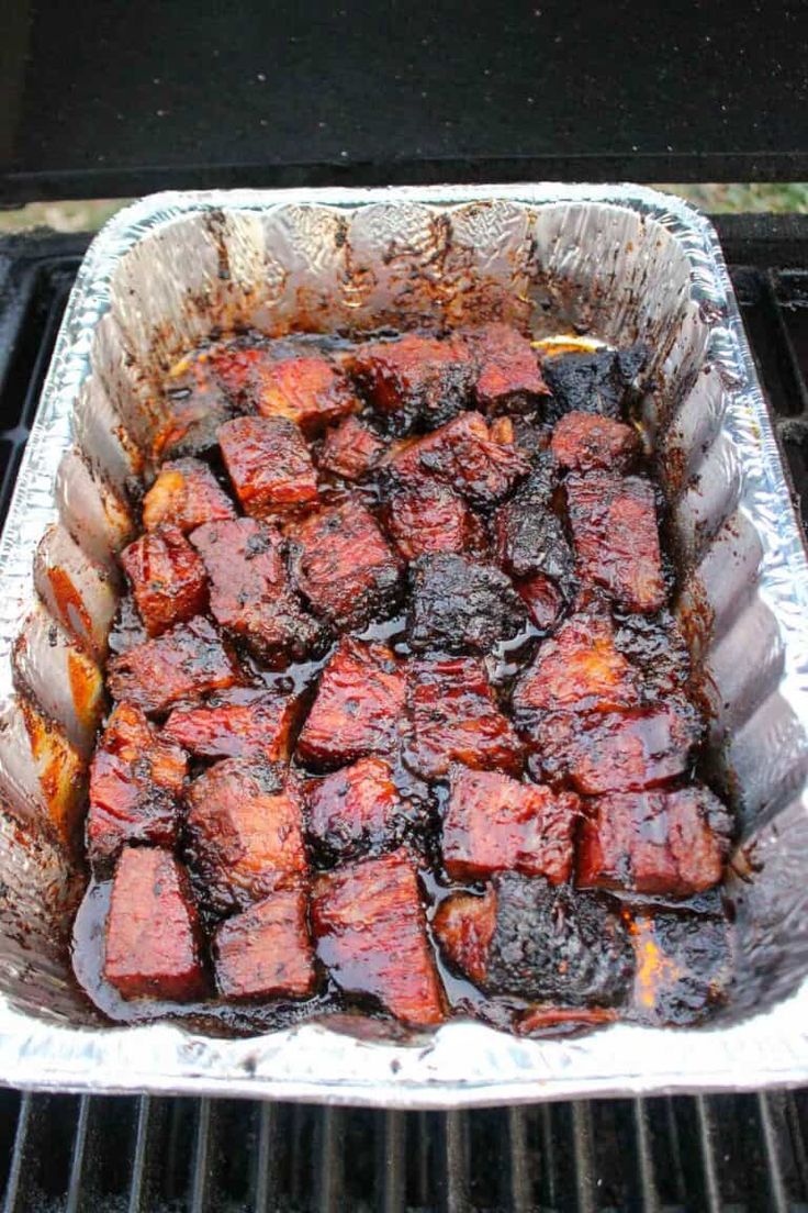 the meat is cooking on the grill and ready to be cooked in the oven for dinner