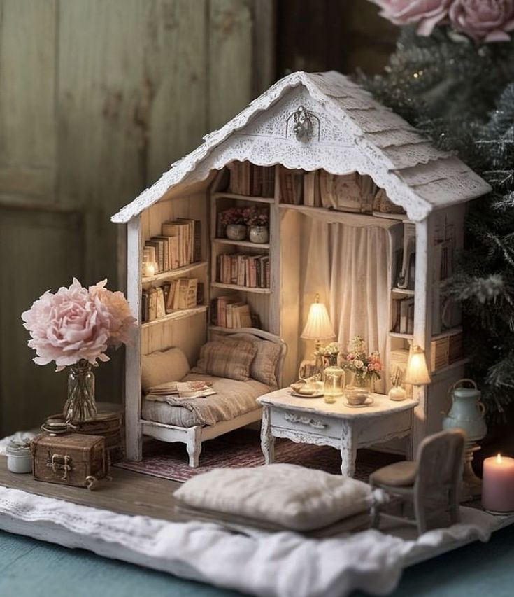 a doll house with furniture and flowers on the table