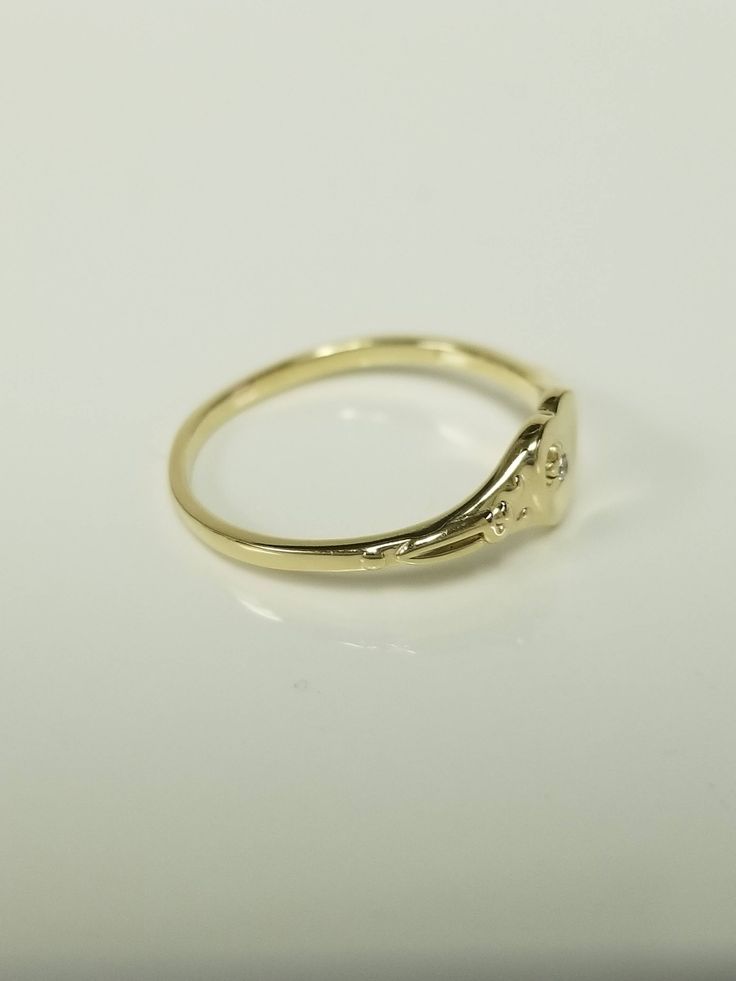 "Thanks for shopping our vintage estate store. We tend to sell well below wholesale and truly hope you enjoy all of our items. Many of the items are one of a kind, so please enjoy scrolling through the pictures and hopefully something will catch your eye. Black spots are from reflections. Estate 14k yellow or rose gold heart diamond ring. Beautiful ring, one that you will love. Color: Yellow or Rose Gold please select the color Ring size: 3 or 5 Setting: 6mm 1/4\" Band width: 1.2mm Weight: 1.25 Heart Diamond Ring, Diamond Heart Ring, Rose Gold Heart, Heart Diamond, Engagement Bands, Band Engagement Ring, Diamond Rings Bands, Pinky Ring, Color Ring