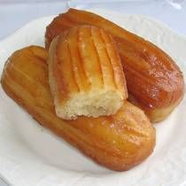 two pieces of bread sitting on top of a white plate