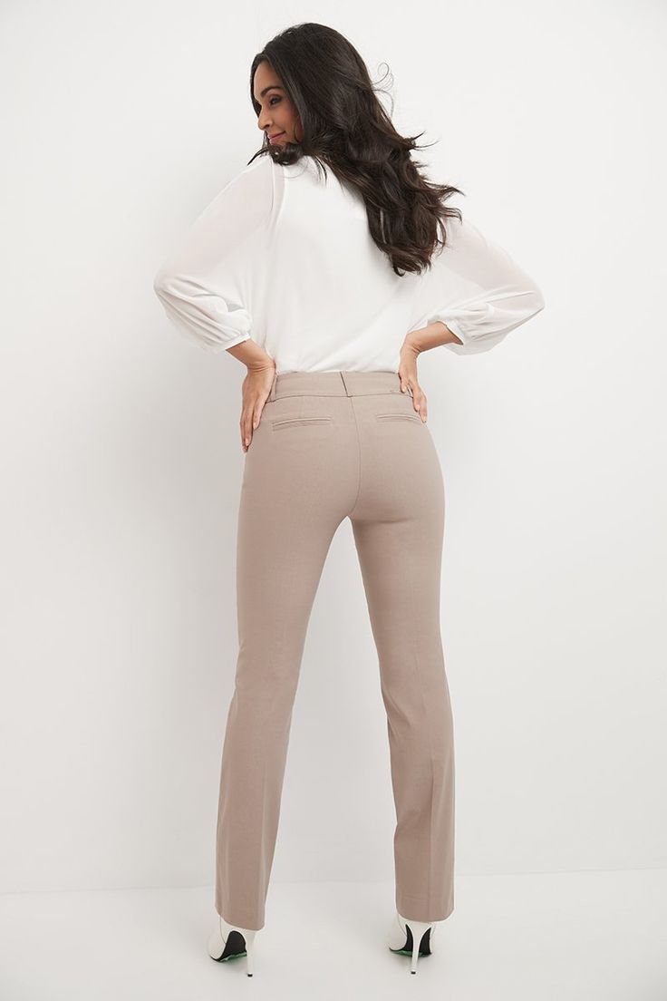 You want to be known for your work but, at the same time, also make a statement with your signature look. These barely bootcut pants let you strike the right balance between flamboyant and subtle. The modern, slightly narrower leg of these pants preserve everything good about the classic bootcut design, while the soft waistband supports and has a slimming effect on your figure. Pair them up with formal or casual tops to easily get the perfect look for any occasion. Faux front and back pockets wi Elegant Stretch Flares With Straight Leg, Elegant Stretch Straight Leg Flares, Classic Fitted Flares For Workwear, Elegant Straight Leg Flares For Workwear, Tailored Flare Bottoms For Business Casual, Fitted Full-length Workwear Flares, Fitted Full-length Flares For Work, Elegant Fitted Flares For Workwear, Elegant Fitted Flares For Work