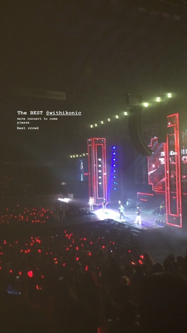 the stage is lit up with red and blue lights