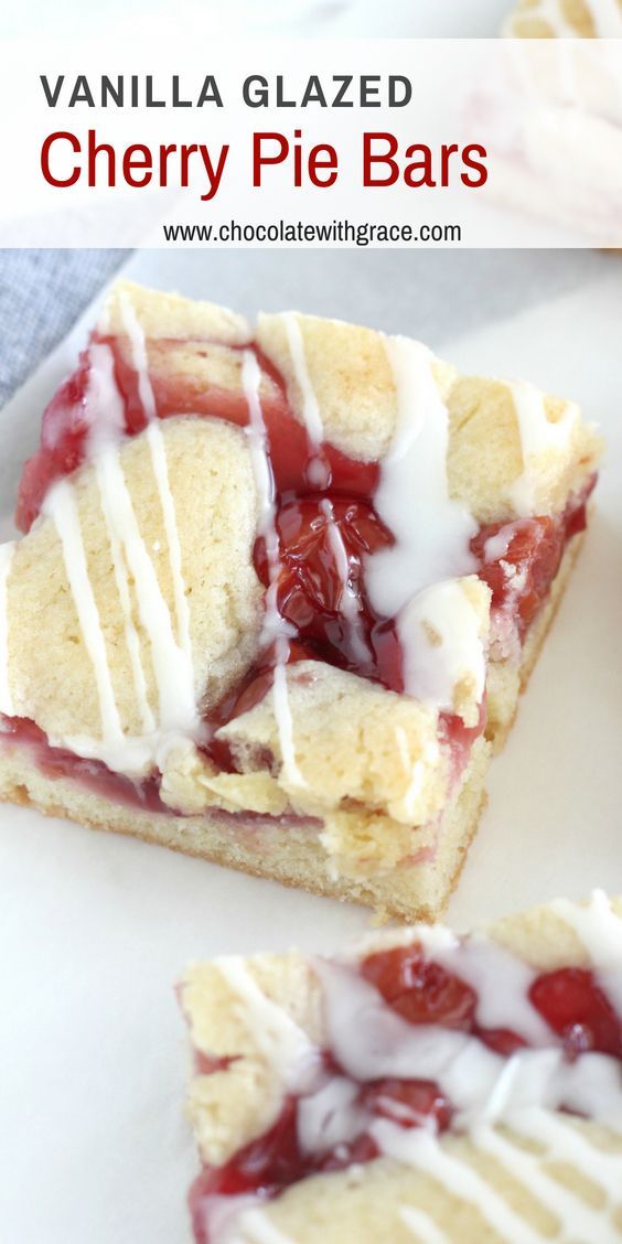 strawberry shortcakes with white icing and strawberries on top