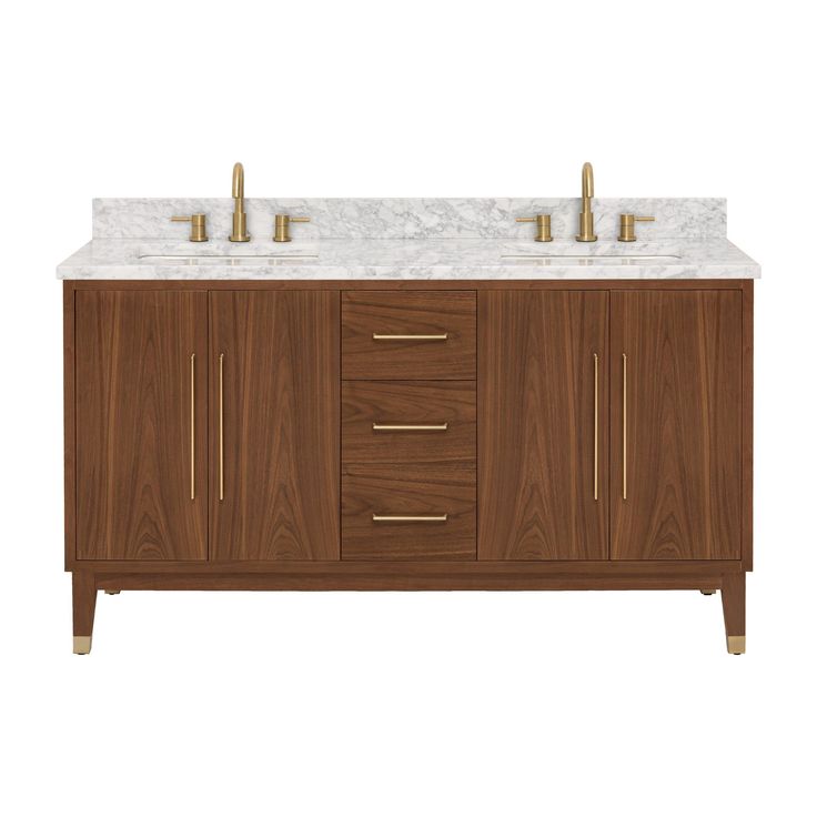 a bathroom vanity with two sinks and gold faucets on the top, against a white background