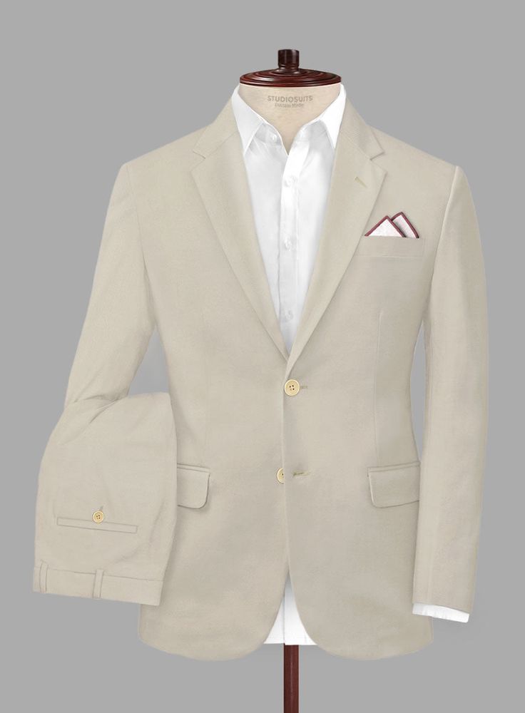 Cherish comfort and a smart appearance with our Army Khaki Stretch Chino Suit, which embraces the feel of natural cotton and the essence of effortless style. Customized from a blend of cotton and lycra, our suit features comfortable draping and a soothing khaki hue that reflects the calm of nature. It is perfect for casual outings, formal engagements, and laid-back gatherings. Ready to modernize your wardrobe? Shop now and find your stride with our suit that reflects confidence.  Look Includes    Army Khaki Stretch  Chino Fabric  Two Button Jacket Style  Notch Lapel   Corozo     Beige  Buttons  Single Vent  Three Cuff Buttons  Two Welted Back Pockets on Trousers    Click 'Customize Now' to modify the look if needed.    Lining: Viscose; Dry Clean. Tailored Cotton Suit With Welt Pockets, Tailored Cotton Suits With Welt Pockets, Cotton Long Sleeve Suits For Semi-formal Occasions, Semi-formal Long Sleeve Cotton Suits, Slim Fit Cotton Suit For Work, Slim Fit Cotton Suits For Workwear, Classic Cotton Suit For Work, Single Breasted Cotton Suit For Business Casual, Classic Cotton Business Casual Suits