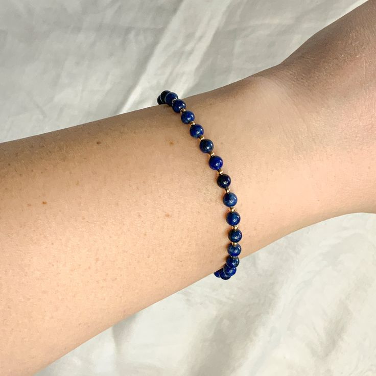 Delicate, adjustable and full of high vibes. Energy from Lapis Lazuli increases intuition and awareness. Adjustable up to 8.5” length - 12 kt Gold plated Brass - Lapis Lazuli Beads, Silk Nylon cord Shipping All orders ship within five (5) business days of when the order is placed. We ship via USPS First Class Mail unless you select otherwise at checkout. If you need an order expedited, include this in the notes on your order and we will try our best to accommodate your needs. We take care to get Hand-strung Lapis Lazuli Bracelets For Meditation, Hand-strung Lapis Lazuli Bracelet For Meditation, Adjustable Lapis Lazuli Bracelet With Round Beads, Adjustable Lapis Lazuli Crystal Bracelet Spiritual Style, Adjustable Spiritual Lapis Lazuli Crystal Bracelet, Adjustable Lapis Lazuli Stretch Bracelet With Round Beads, Adjustable Lapis Lazuli Gemstone Beaded Bracelets, Adjustable Lapis Lazuli Bracelets As Gift, Adjustable Lapis Lazuli Beaded Bracelets