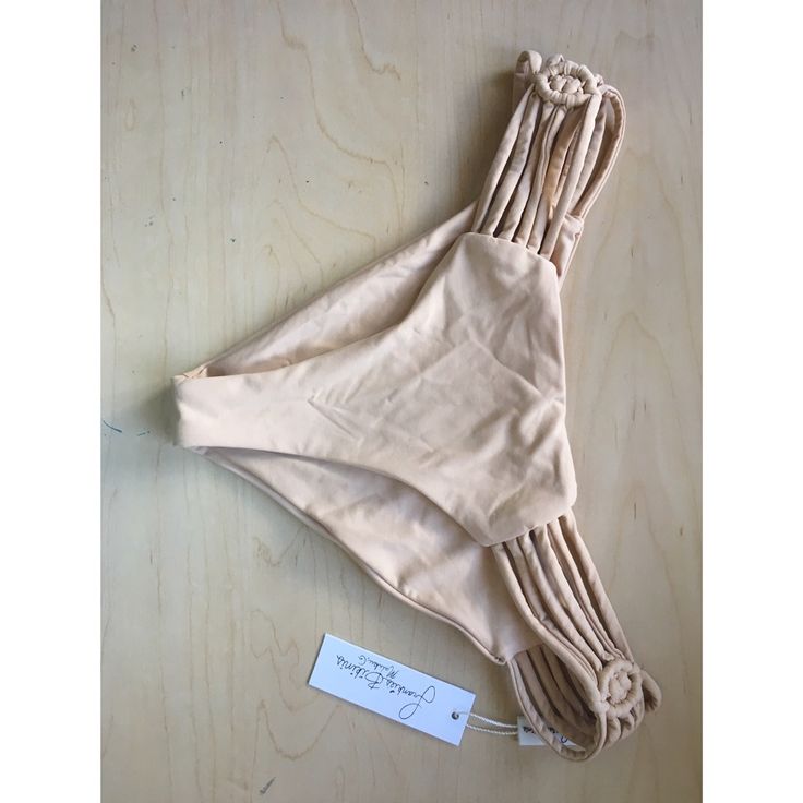 Frankie's Bikinis "Willow" Bottom In Nude Size Medium. Brand New With Tags, Never Worn. Shown On Model In White. Really Cute, Just Didn't Fit Me! Fitted Beige Swimwear For Sunbathing, Fitted Beige Bottoms For Beach Season, Beige Fitted Bottoms For Beach Season, Beachwear Stretch Swimwear In Beige, Beige Stretch Swimwear For Beach, Fitted Beige Swimwear For Beach Party, Fitted Beige Bottoms For Beachwear, Beige Beachwear Bottoms For Pool, Beige Swimwear For Beach Festival