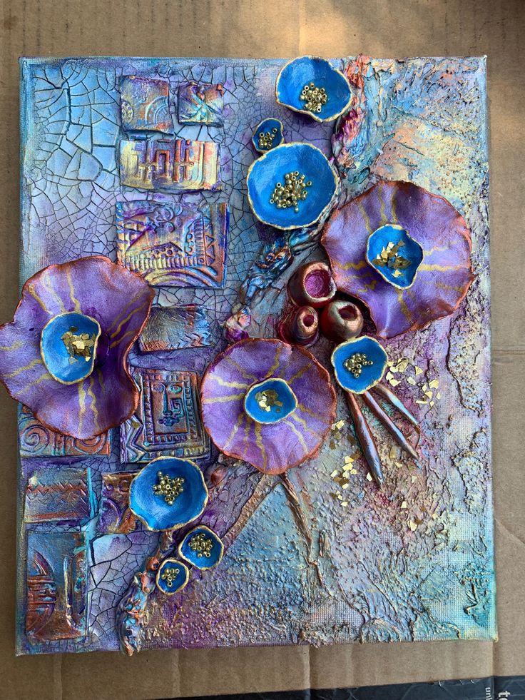 an art work with blue and purple flowers