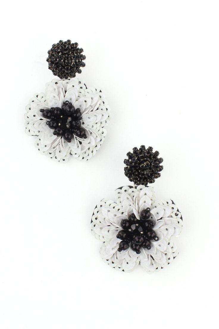 Black and white sequin and bead dangle earrings. Pierced Style Backing Black and White White Beaded Earrings For Spring Party, White Drop Flower Earrings For Party, White Flower Drop Earrings For Parties, White Flower Earrings For Evening, White Beaded Flower Earrings For Party, White Beaded Earrings For Spring, Elegant Beaded Earrings For Spring Party, Elegant Spring Beaded Earrings For Party, Elegant White Flower Shaped Beaded Earrings