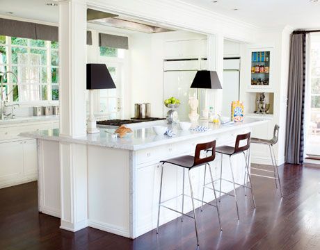 the kitchen is clean and ready to be used as a dining room or living room