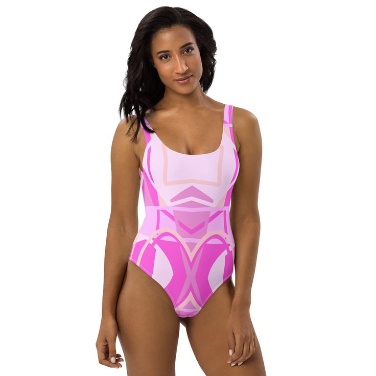 This one-piece swimsuit for all figures will bring out your best features. Enjoy the smooth fabric and the flattering design, and show it off by the sea or pool! * 82% Polyester, 18% Spandex * Fabric weight: 6.78 oz/yd² (230 g/m weight may vary by 5% * Chlorine-resistant fabric * Cheeky fit with a scoop neckline and a low scoop back * Zig-zag stitching * Double-layer front  * Four-way stretch material stretches and recovers on the cross and lengthwise grains This product is made especially for you as soon as you place an order, which is why it takes us a bit longer to deliver it to you. Making products on demand instead of in bulk helps reduce overproduction, so thank you for making thoughtful purchasing decisions! Pink Swimwear With Uv Protection, Pink Swimwear With Uv Protection For Swimming, Fitted Lined Swimwear For Beach, Fitted Pink Swimwear With Uv Protection, Contoured Bodysuit For Summer Swimming, Pink Stretch One-piece Swim Dress, Beachwear Leotard With Lined Body, Pink Swimwear For Water Sports And Beach Season, Fitted Pink Swim Dress For Poolside