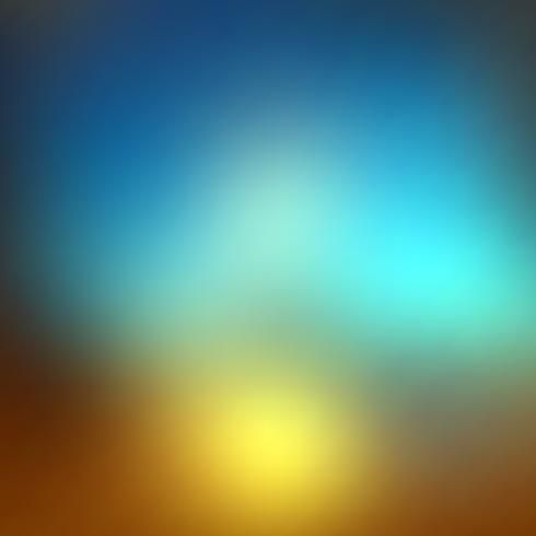 an abstract blurry background in blue, yellow and brown