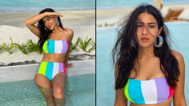 The summer season is here and now it is time to take the sexy swimwear and beachwear out. Speaking of which, actor Sara Ali Khan was seen enjoying summer to the fullest recently while making our day colourful. The actor took to her Instagram account and dropped a few pictures wearing a sexy multicolour bikini as she was seen posing in a swimming pool. Her bikini consisted of a tube top along with a high waist bottom. Flaunting her sunkissed skin and wavy beach hair, Sara rounded her look with ch Wavy Beach Hair, Sunkissed Skin, Sara Ali Khan, Ali Khan, Enjoy Summer, High Waist Bottoms, Toned Body, Trending News, Bollywood News