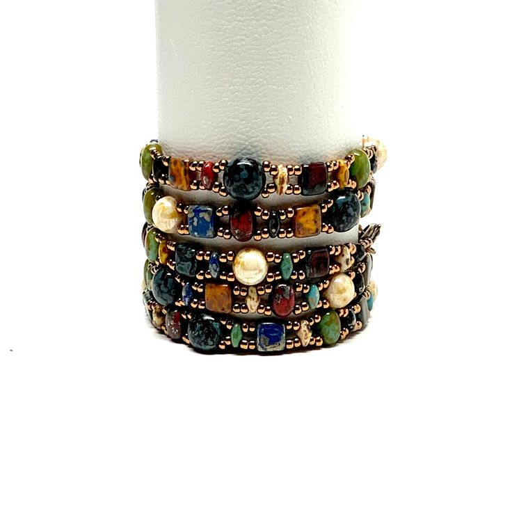 This bracelet pairs well with many of my other bracelets so it’s easy to stack and layer.  It also wears well alone. The shape is perfect for a smooth interior finish to the bracelet and comfortable wearing for you. The black half dome Czech glass beads are called candy beads.  How could I name the bracelet anything el Multicolor Hand Wrapped Multi-strand Bracelets, Adjustable Stacked Bangle Bracelets, Bohemian Multicolor Stacked Beaded Bracelets, Elegant Multicolor Stackable Jewelry, Elegant Multicolor Stackable Bracelets, Elegant Multicolor Hand Wrapped Wrap Bracelet, Elegant Multicolor Stackable Stretch Bracelet, Stacked Bangle Bracelets As Gift, Stacked Adjustable Beaded Bracelets