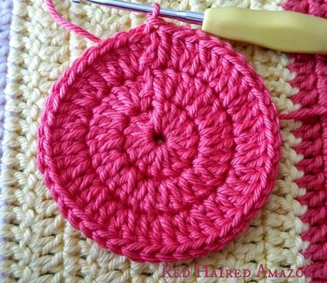 a crochet pattern with yarn next to it