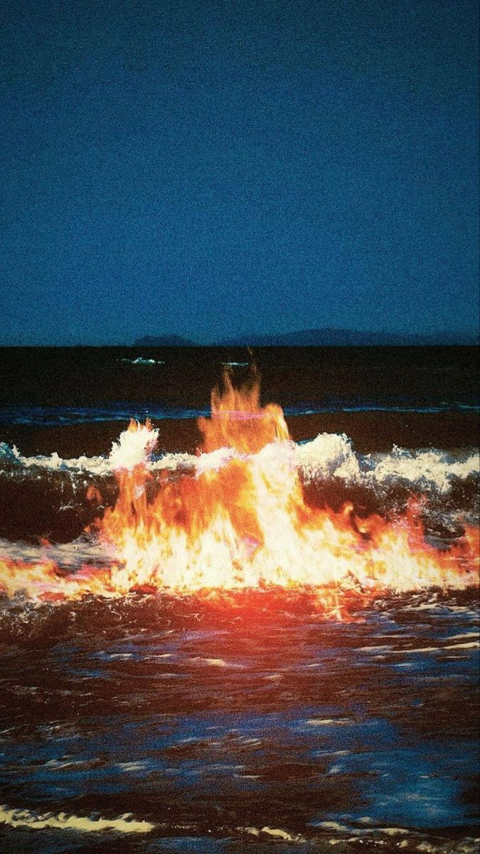 an image of a fire on the ocean