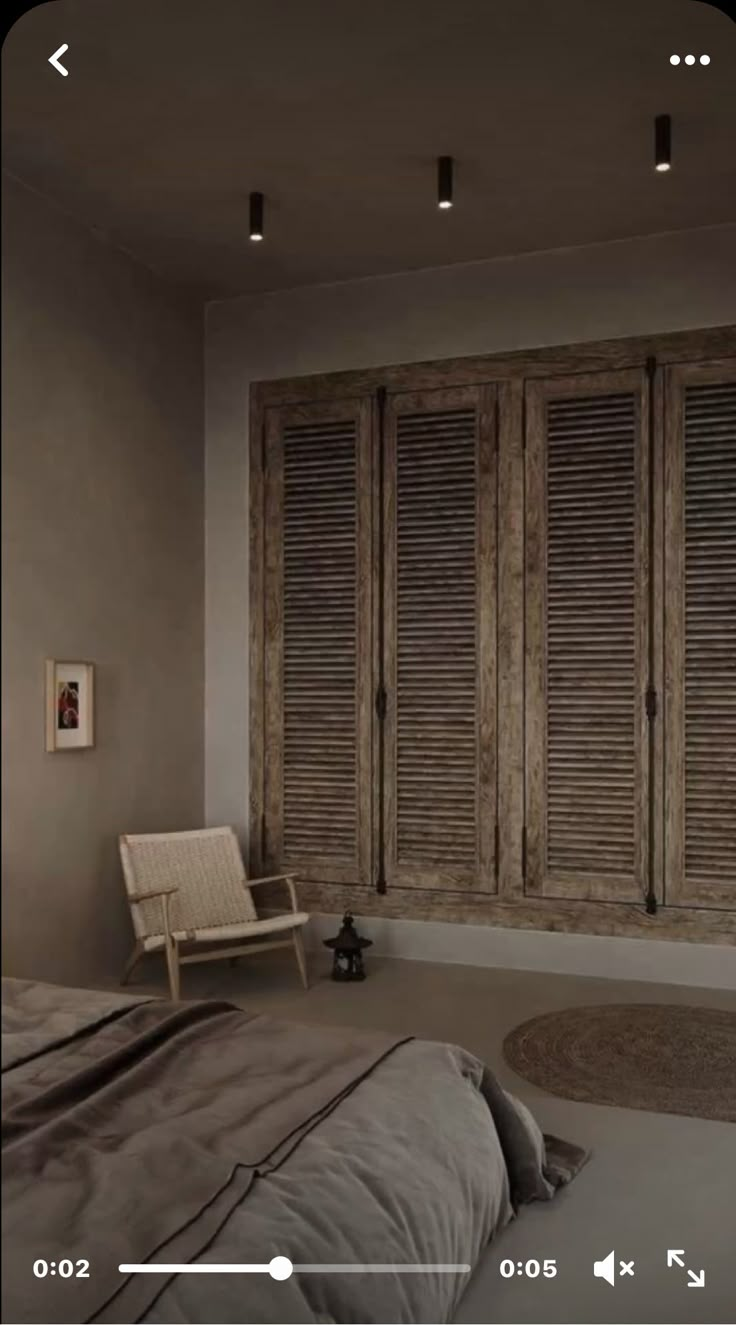 an image of a bedroom setting with shutters