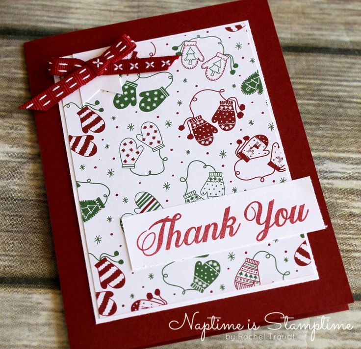 a handmade thank card with red and green christmas decorations on it, sitting on top of a wooden table