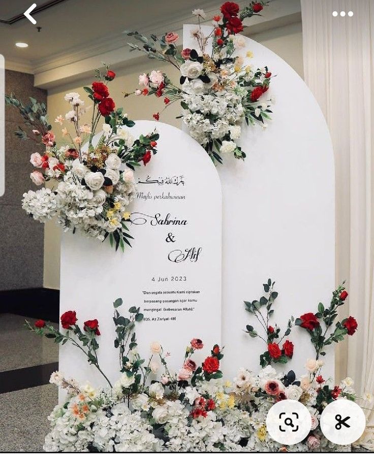 an arch decorated with flowers and greenery for a wedding or special event in singapore