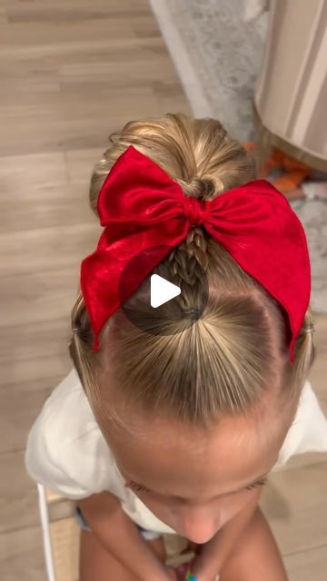 Little Poppy Co. on Instagram: "Another back to school style from the greatest @calla.mckinley 🎀❤️ we’re still crushin on this red bow from July!!   #hairstyle #toddlerhair #backtoschool #backtoschoolshopping #backtoschoolhairstyles #backtoschoolhair #toddlerfashion" Cheer Bun With Bow, Toddler Cheer Hairstyles, Girls Hairstyles With Bow, Kindergarten School Pictures Hair, Cheer Hair With Bow, Big Bow Hairstyle For Kids, Girls Bow Hairstyles, Cheerleader Hairstyles With Bows, Easy Cheer Hairstyles With Bow