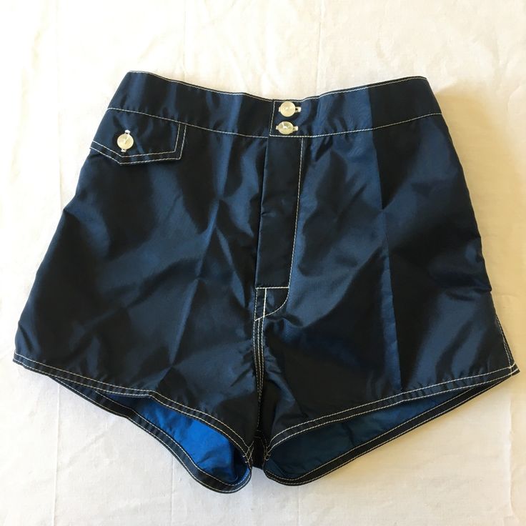 Nwot Birdwell Beach Britches Board Shorts Swim Trunks. They Have A Front Pocket, Side Slits And Double Button Closure. They Run Small, Please Read Entire Description. Color: Dark Navy (Almost Black) Tag Size: 26 Measurements: Waist 24” Rise 12” Inseam 1.5” Best Fit: 23 *Color Of Inner Lining May Vary* **Please Note These Run Small. For Best Fit, I Suggest Purchasing 2-3 Sizes Larger Than Your Usual Size. They Are Listed At The Size They Fit Best** Navy Shorts For Poolside, Fitted Beachwear Bottoms With Pockets, Summer Swim Bottoms With Short Inseam, Summer Swimming Bottoms With Short Inseam, Casual Vacation Bottoms With Button Closure, Casual Bottoms With Button Closure For Vacation, Blue Short Leg Swim Trunks For Beach, Beachwear Bottoms With Short Inseam For Beach Season, Summer Fitted Navy Bottoms