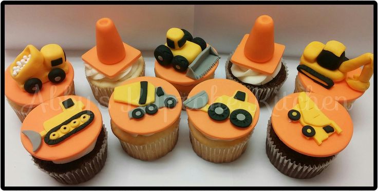 cupcakes with construction themed frosting on them