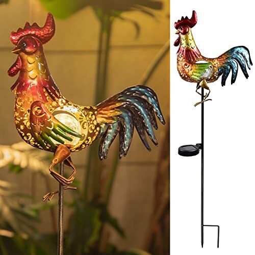 a colorful rooster weathervane sitting on top of a pole next to a potted plant