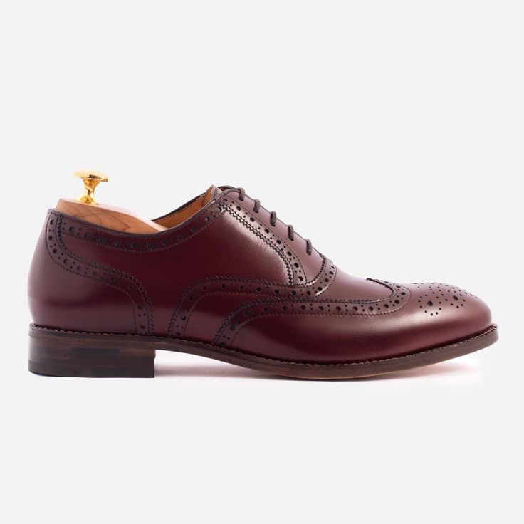 Stylish shoes for any occasion. Starting off with a traditional Oxford design, the Yates Oxfords get to have some fun. Adorned with hand-punched broguing and pinking, the elaborate design makes a bold statement from the outset. The stunning medallion on the toe box, coupled with the perfectly executed wingtip that swoops away from the vamp and textural broguing throughout, distinguishes the Yates not only from other Oxfords, but from all other styles. They can be dressed up or down effortlessly Elegant Perforated Plain Toe Oxfords, Elegant Oxfords With Perforations And Plain Toe, Elegant Leather Wingtip Shoes With Perforations, Elegant Plain Toe Oxfords With Perforations, Wingtip Lace-up Shoes With Rubber Sole For Galas, Wingtip Lace-up Shoes With Brogue Detailing For Galas, Wingtip Dress Shoes With Stitched Sole For Galas, Gala Wingtip Lace-up Shoes With Brogue Detailing, Elegant Formal Oxfords With Perforations