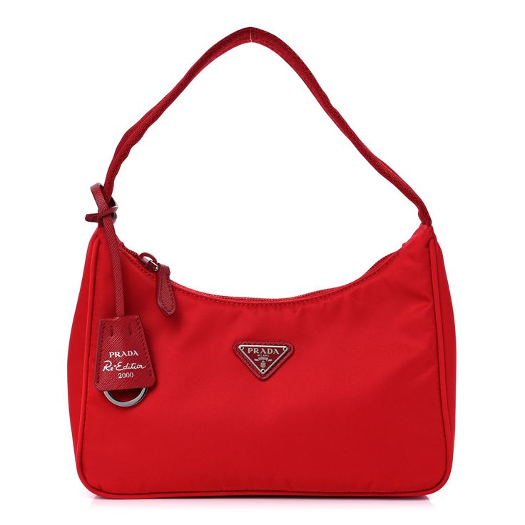 This is an authentic PRADA Tessuto Nylon Mini Re-Edition 2000 Bag in Rosso. This petite Prada handbag is crafted of sturdy red tessuto nylon with silver hardware. The bag features a nylon shoulder strap and the top zipper opens to a red jacquard fabric interior. 1400803 Red Prada Bag, Prada Nylon Bag, Prada Handbag, Prada Nylon, Prada Handbags, Jacquard Fabric, Nylon Bag, Prada Bag, Silver Hardware