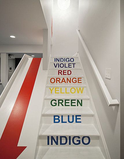 the stairs are painted with different colors to match each other's decorating style