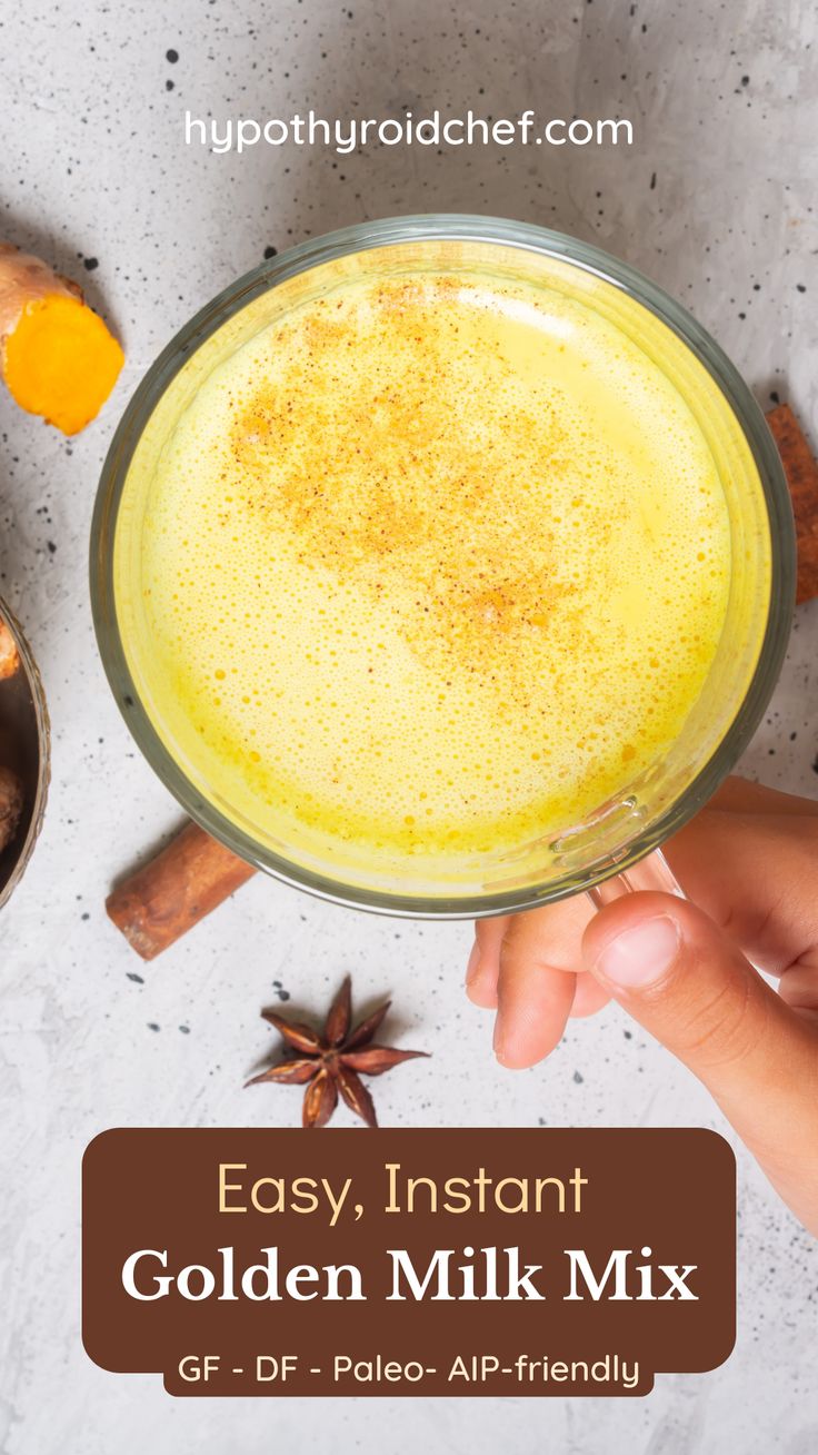 the golden milk mix is in a glass bowl with cinnamons and anise on top