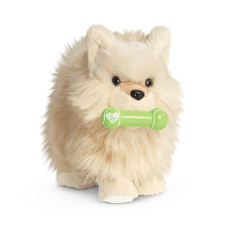 a white stuffed animal with a green handle