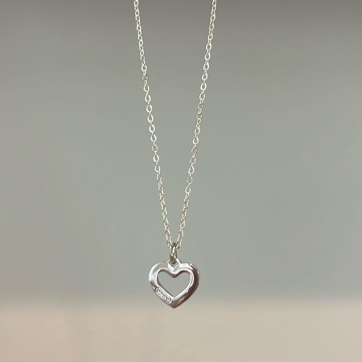 Nwot Sterling Silver Coach Necklace Approx 17” Beautiful! Classic Heart-shaped Sterling Silver Necklace, Silver Dainty Heart Necklace, Sterling Silver Necklace With Heart Detail In Silver, Silver Heart Pendant Necklace With Heart Detail, Silver Necklace With Heart Detail, Dainty Silver Heart Necklace, Classic Everyday White Gold Heart Necklace, Silver Heart Necklace With Delicate Chain, Classic White Gold Heart Necklace For Everyday