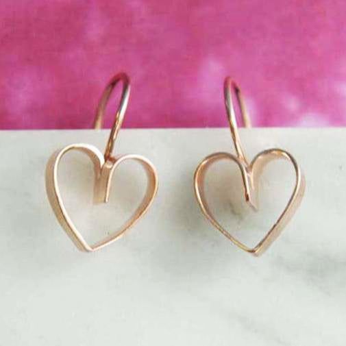 Dainty, cute and highly wearable, these Lace Heart Drop Earrings are made by our silversmith by shaping flat Sterling Silver wire carefully and creatively into a heart profile and attaching the ear wire before being plated in Rose gold in our UK workshop. Available in Silver, Gold and Rose Gold vermeil, the earrings can be paired with the matching pendant necklace creating a lovely jewellery set ideal for gifting. Also available in: 18k Yellow Gold Plated Sterling Silver Made from: Vermeil - 18kt rose gold plated sterling silver. Meaurements: Earrings dimensions: approx 1 cm width and 1 cm height. Pendant size: approx. 1.2 cm width and 1.4 cm heigt. Our standard chain length is 16'' plus 2'' extensions which makes the total length 18'' Rose Gold Drop Earrings, Gold Heart Earring, Lace Heart, Rose Gold Heart, Heart Drop Earrings, Lovely Jewellery, Matching Necklaces, Heart Of Gold, Pendant Set