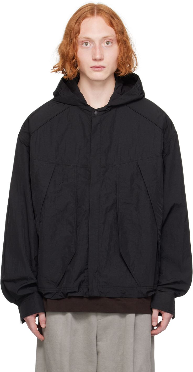 Nylon taffeta jacket. · Bungee-style drawstring at hood · Concealed zip closure · Zip pockets · Concealed bungee-style drawstring at hem · Dropped saddle shoulders · Adjustable single-press-stud barrel cuffs · Unlined Supplier color: Black Utility Hooded Windbreaker With Drawstring, Hooded Utility Outerwear With Functional Drawstring, Utility Windbreaker With Drawstring For Winter, Hooded Utility Jacket With Drawstring For Outdoor, Winter Utility Windbreaker With Drawstring, Utility Nylon Outerwear With Functional Drawstring, Utility Nylon Hooded Jacket With Double-lined Hood, Hooded Outerwear With Functional Drawstring For Streetwear, Streetwear Nylon Windbreaker With Functional Drawstring