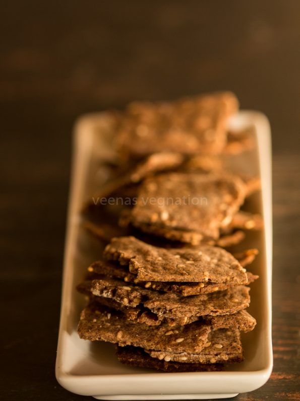 some crackers are sitting on a white plate