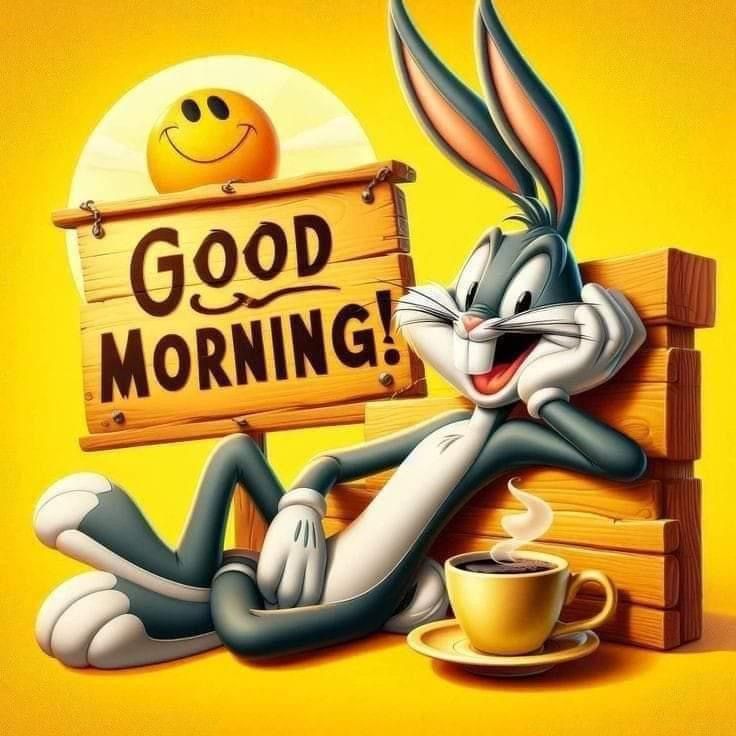 a cartoon bunny sitting next to a sign that says good morning with a cup of coffee