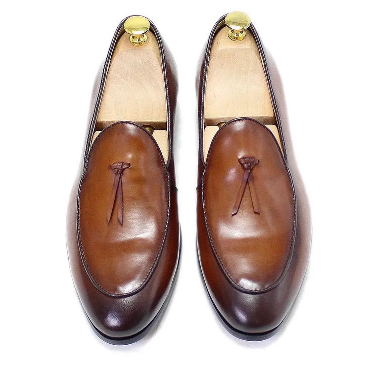 Sizes 6-13 Brown Tassel Loafers For Galas, Brown Slip-on Tassel Loafers For Galas, Luxury Brown Tassel Loafers For Semi-formal, Luxury Brown Tassel Loafers For Semi-formal Occasions, Elegant Brown Tassel Loafers With Leather Sole, Brown Tassel Loafers With Almond Toe For Galas, Brown Tassel Loafers With Brogue Detailing For Galas, Brown Semi-formal Tassel Loafers With Round Toe, Brown Tassel Loafers With Almond Toe And Leather Sole