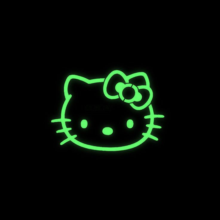 a neon green hello kitty wallpaper in the dark