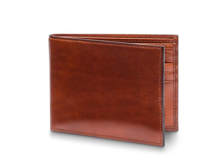 The 8 Pocket Wallet is a classic men's wallet with lots of character. There is plenty of storage in this bifold wallet, making it a perfect fit for those with a lot to carry. Inside there are eight card slots, for all of your IDs, credit cards, business cards and more. Tucked in the center are two vertical pockets for more cards and receipts. Likewise, the cash well is split into two sections for even more organizational options. If you're worried about someone stealing your personal information Bifold Wallet Men, Front Pocket Wallet, Rfid Wallet, Men's Wallet, Wallets For Women Leather, Cards Business, Pocket Wallet, Leather Bifold Wallet, Mens Leather Bag