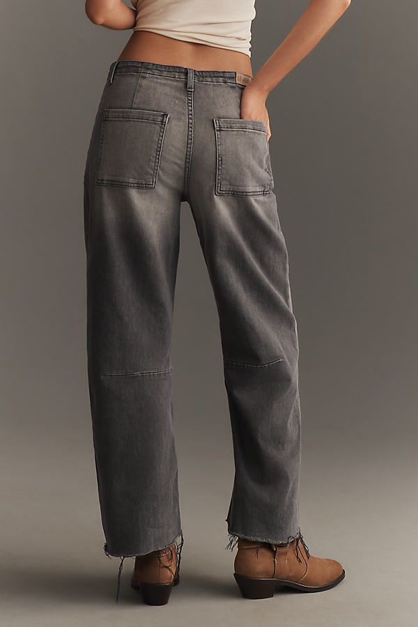 Denim, decoded: This fall, we’re digging denim in every corner of our closet. The Jean Low-Slung Barrel Jeans are a loose-fitting pair with utility pockets and a frayed hem. | Utility Low-Slung Barrel Jeans by Le Jean in Grey, Women's, Size: 32, Cotton/Elastane at Anthropologie High Rise Relaxed Fit Washed Black Cargo Jeans, High Rise Relaxed Fit Cargo Jeans In Washed Black, Utility Cargo Jeans For Elevated Casual Fall, Fall Utility Cargo Jeans For Elevated Casual Wear, Chic Relaxed Fit Cargo Jeans, Trendy Elevated Casual Cargo Jeans With Pockets, Washed Black Utility Jeans With Five Pockets, Casual Cargo Jeans With Frayed Hem For Fall, Fall Wide Leg Washed Black Cargo Jeans