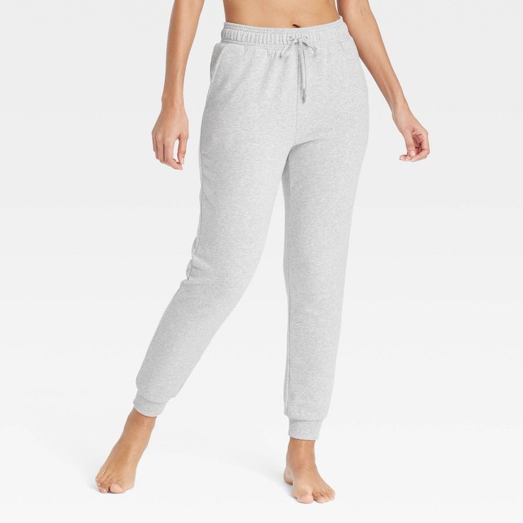 Stay effortlessly cozy as you lounge around the house wearing these Fleece Jogger Pants from Auden™. Made from ultra-soft, brushed fleece fabric for a relaxed, easy fit that's perfect for lounging, these joggers are designed with a regular rise and tapered legs. The front drawstring tie provides a customizable fit, while side pockets give you space for stashing small essentials. Auden™: Comfort true to every shape & hue. Comfy Sweats With Elastic Waistband For Lounging, Sweatpants With Elastic Waistband For Lounging, Cozy Activewear For Loungewear With Elastic Waistband, Cozy Activewear With Elastic Waistband For Lounging, Cozy Long Sweatpants For Loungewear, Cozy Fit Fleece Bottoms For Loungewear, Comfortable Fleece Bottoms For Loungewear, Cozy Joggers With Elastic Waistband For Loungewear, Cozy Loungewear Sweatpants