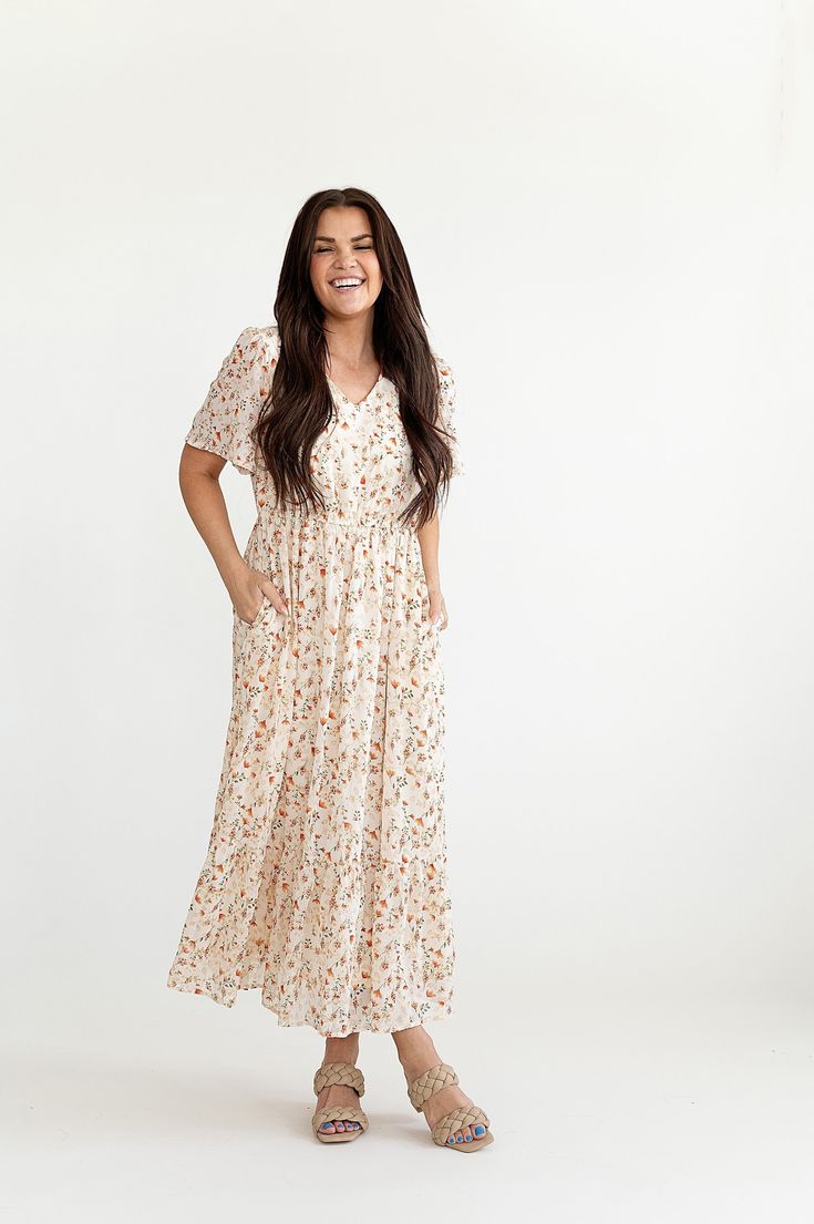 Description Features V-Neck Unlined short bell sleeve Elastic waist Single tiered skirt Delicate floral print Body and skirt lined Dress and lining 100% polyester Size + Fit Small 0-4, Medium 4-8, Large 8-12, 1X 12-16, 2X 16-20, 3X 20-24 Kristin is 5'4" a size 3 and is wearing a small Victoria is 5'6" a size 18 and is wearing a size 2X Runs true to size Flowy Tiered Ditsy Floral Dress, Flowy Tiered Ditsy Floral Print Dress, Flowy Tiered Floral Dress With Ditsy Print, Modest Short Sleeve Floral Dress With Ditsy Print, Tier Skirt, Tiered Skirt, British Indian, V Neck Dress, Bell Sleeve