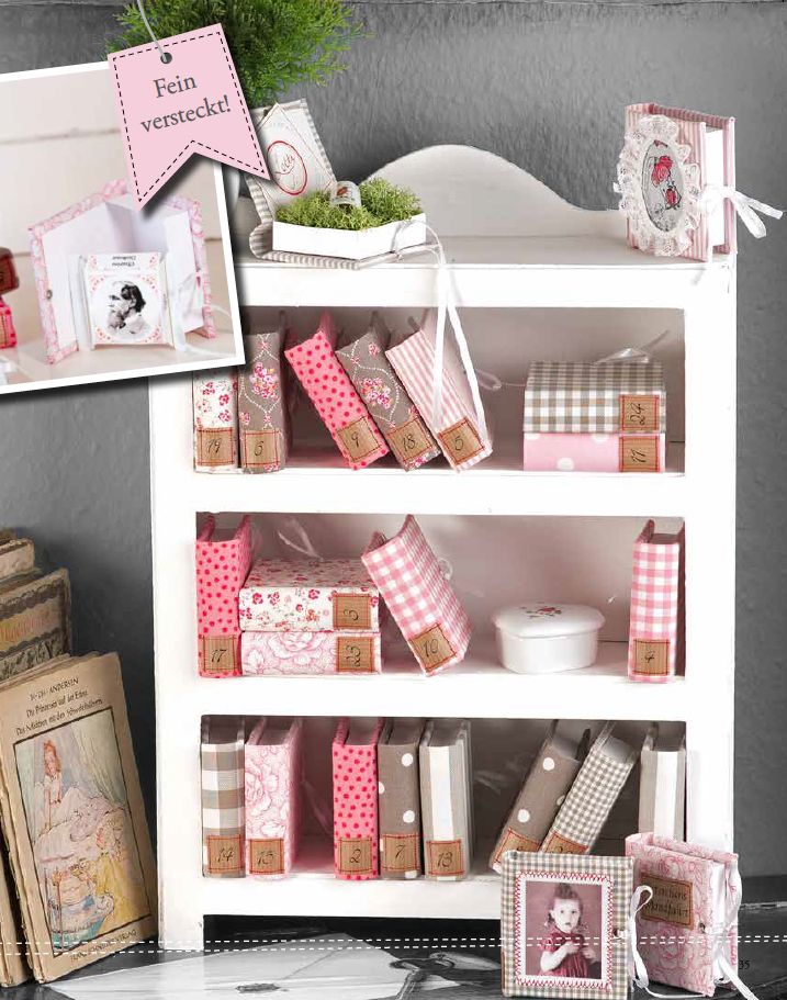 a shelf filled with lots of pink and white items