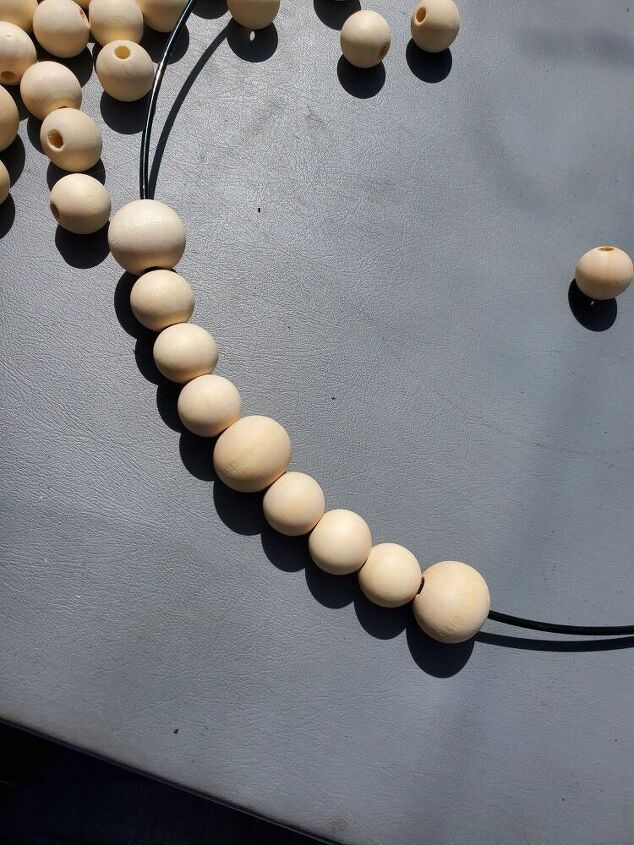 there is a necklace made out of wooden beads