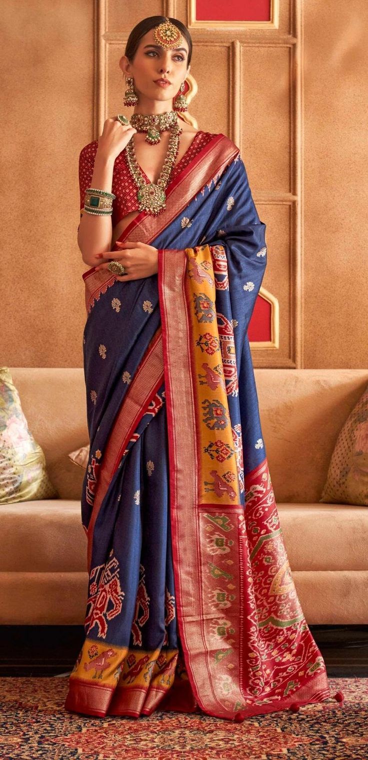 Pure Patola Silk Saree with Beautiful Traditional Style Print which gives Elegant Look to this Saree. Best For Wedding, Parties and All Indian festivals . Patola Sarees are Famous Sarees of India. Fabric : Patola Silk Saree with designer embroidered blouse Type : Designer  Wear, Simple Wear, Traditional Pattern, Festive Wear  Style : Indian Dress,  Traditional Saree,Sarees For All Ocassion Stitch : Blouse UnStitched ( Stitching if customer want Size upto 42 Bust ) Wash : Dry Clean Only Free Ship Patola Print, Blue Silk Saree, Patola Saree, Saree Silk, Wedding Saree Indian, Black Saree, Blue Saree, Art Silk Sarees, Navy Blue Color