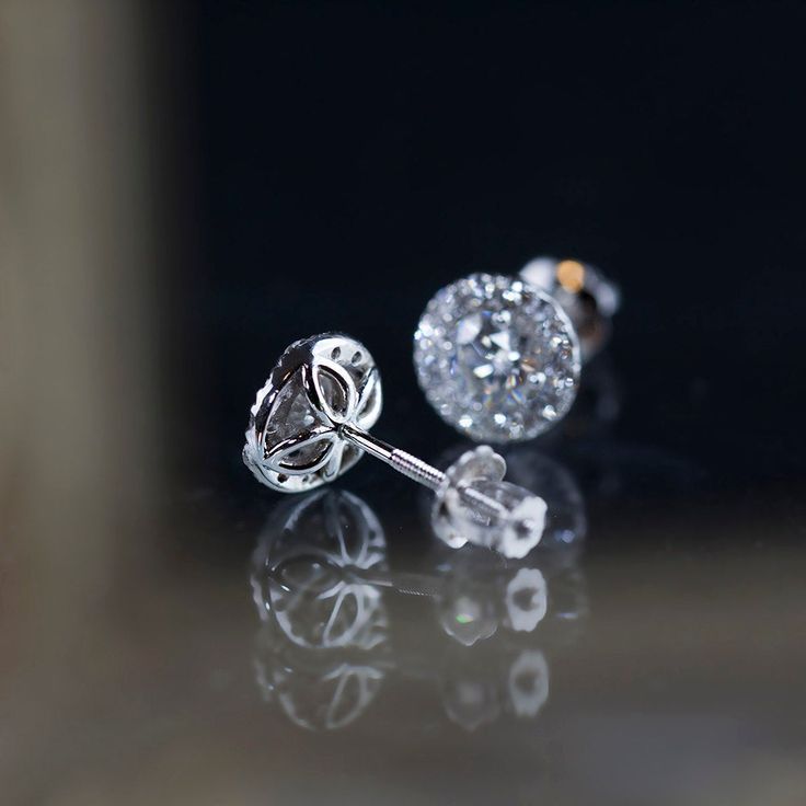 * Center stone: 0.30ct Round brilliant diamond, 4.3x4.3mm, excellent cut, GIA certificate * Halo: 0.26tcw white diamonds, G color, SI clairty * Front view diameter 8mm * Solid gold Screw back earrings for security * 100% recycled gold with choice of 14k yellow, rose or white gold * Setting features beautiful flowers allowing more lights to go through the diamonds to maximize its brilliance * Comes in gift box ready for gifting * Handmade in New York Timeless Diamond Cut Diamond Earrings For Wedding, Elegant Diamond White Cluster Earrings With Halo Setting, Classic Diamond Bridal Earrings With Halo Setting, Timeless Diamond Cut Earrings For Wedding, Luxury Diamond White Halo Bridal Earrings, Classic Bridal Earrings With Halo Setting Diamond, Fine Jewelry Bridal Earrings With Halo Design, Luxury Brilliant Cut Cluster Earrings In Diamond White, Luxury Diamond Cluster Earrings With Halo Setting